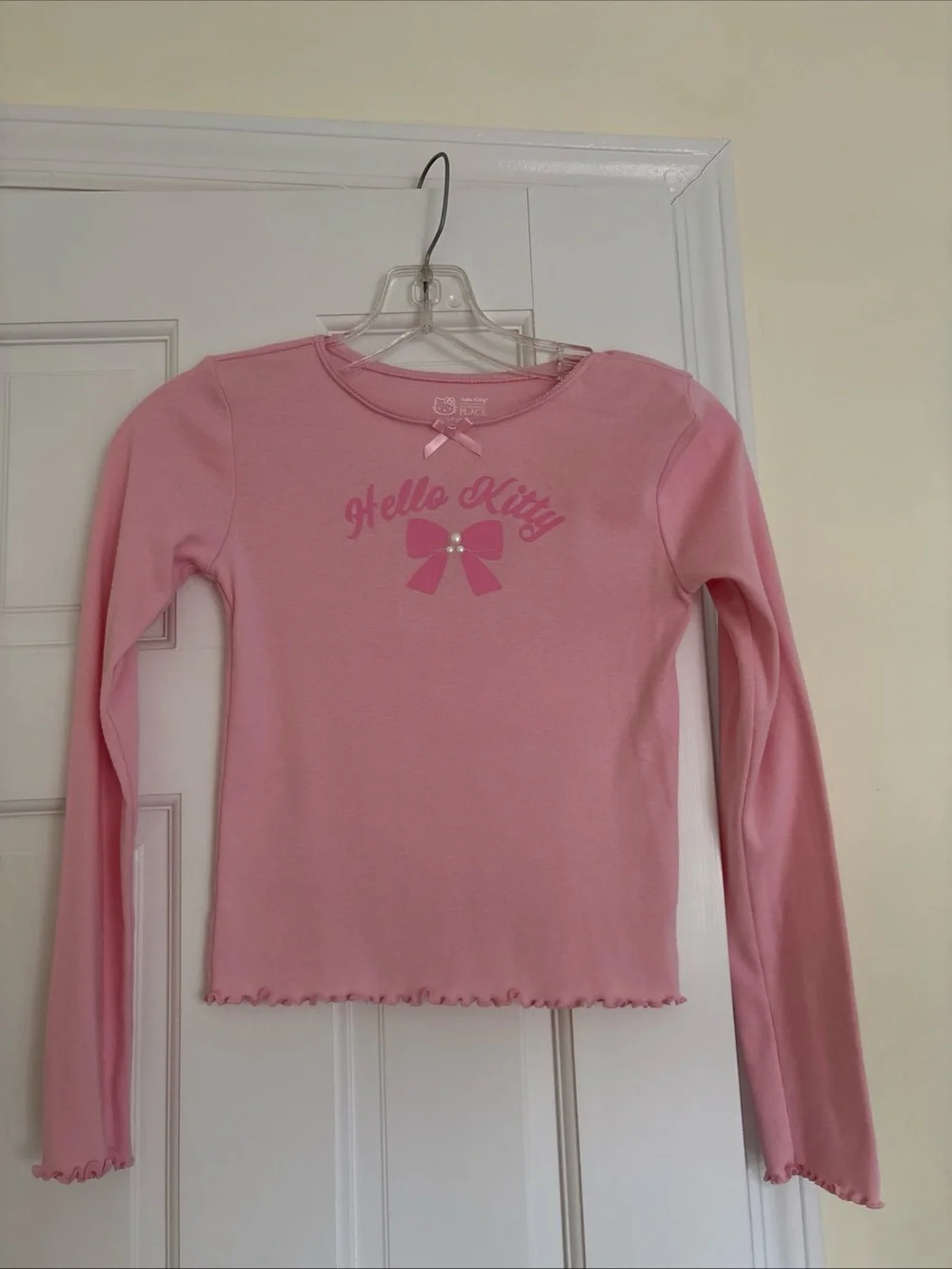 Girls Hello Kitty Light Pink Long Sleeve Top with Pearl Accents, size 10-12